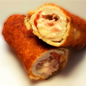 Flamenquín cuatro quesos y pimientos del piquillo